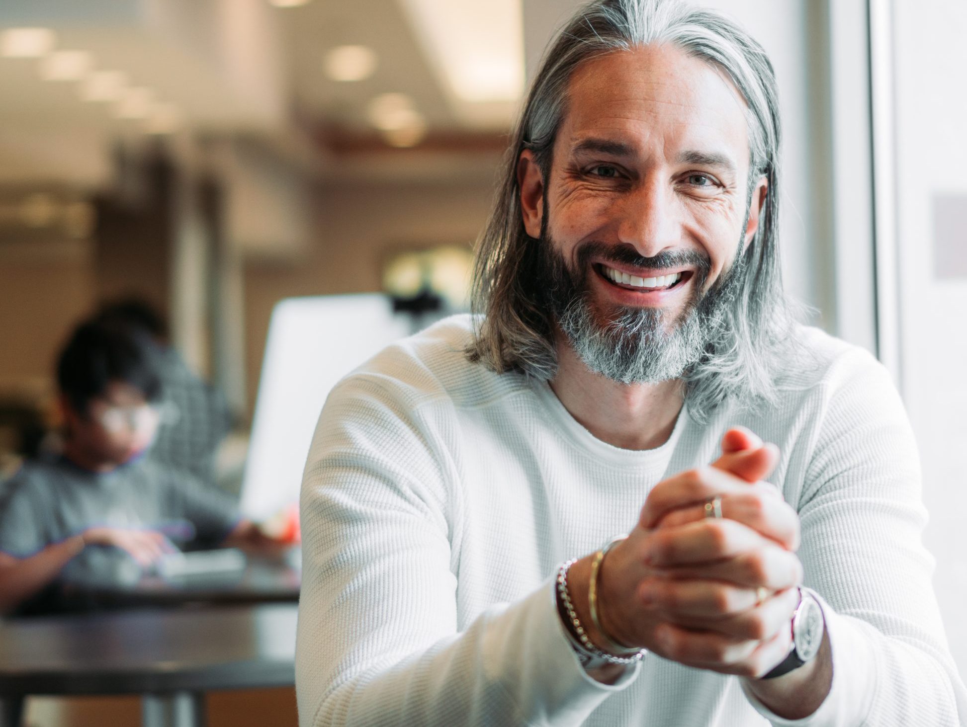 Garrett Gunderson smiling in a bright café
